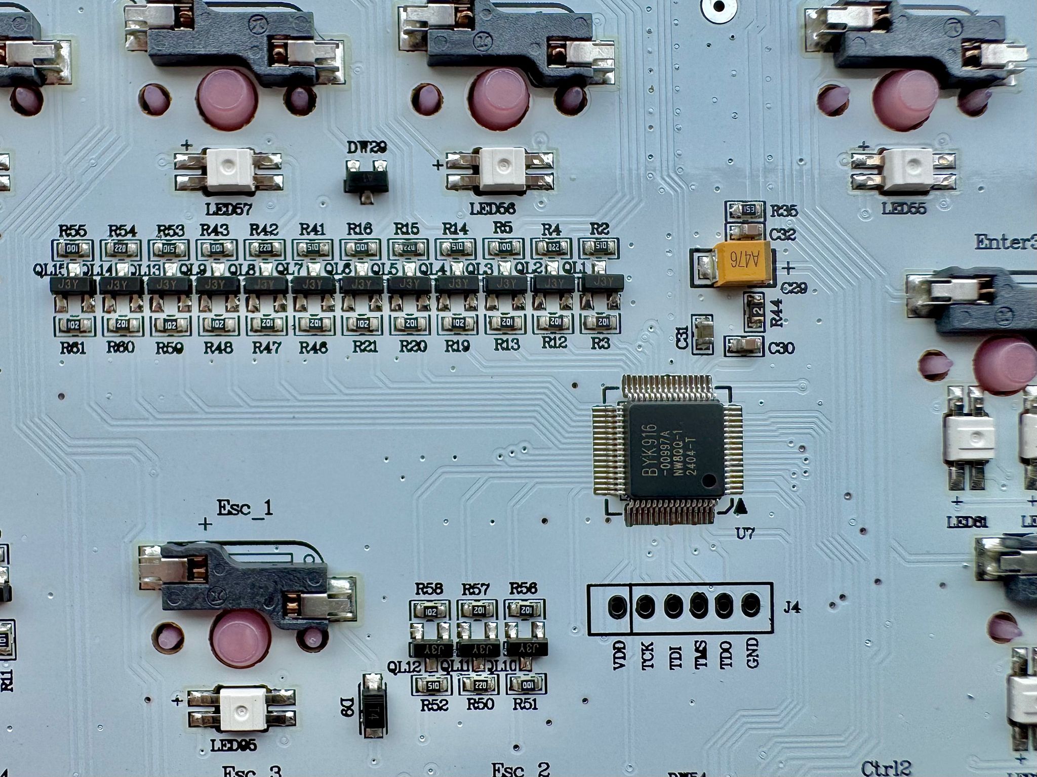 Close up of the keyboard PCB, showing the main controller BYK916